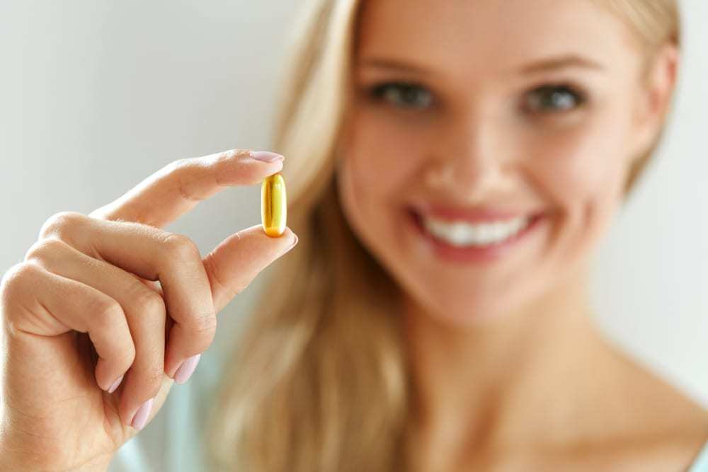 Girl taking pill