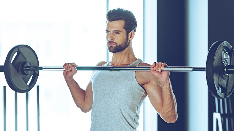 man with barbell