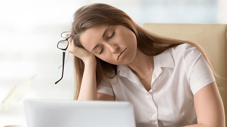 woman-tired-at-desk-3