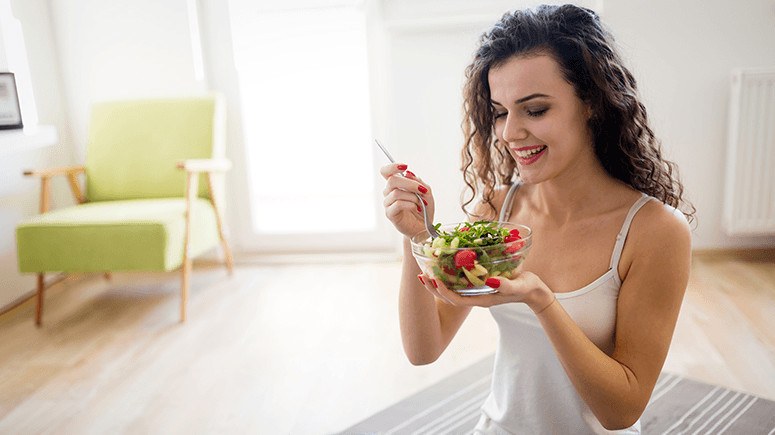 woman eating a salad